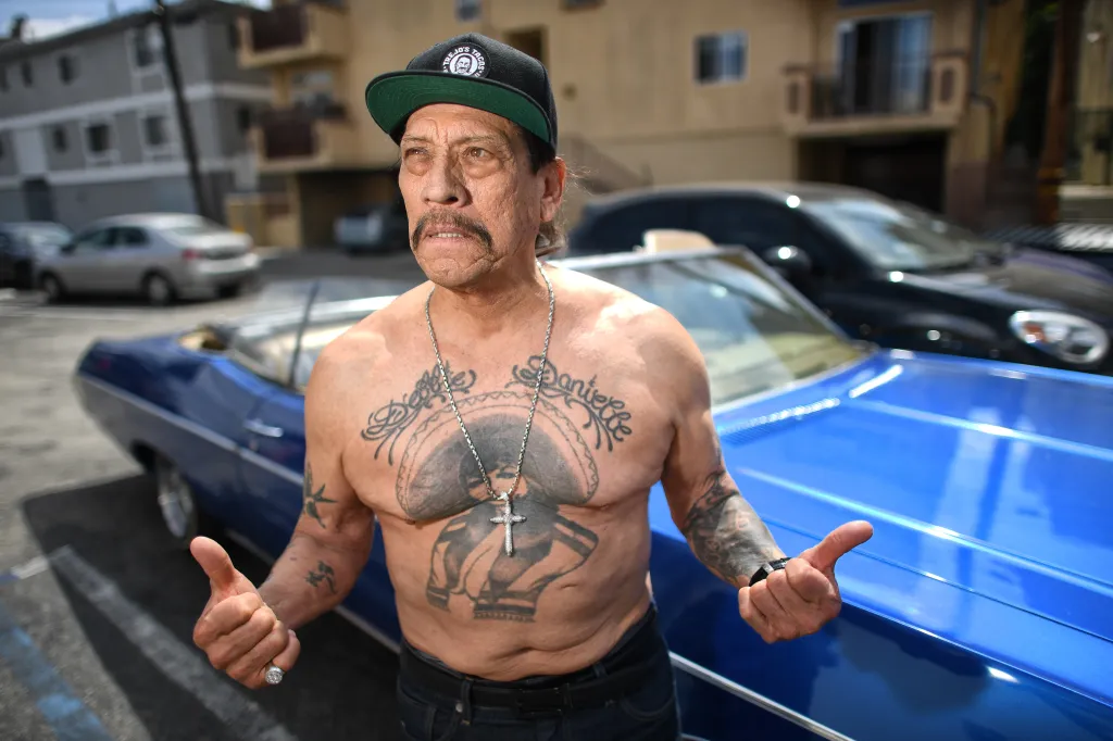 Danny Trejo tattoo represents his journey from prison ink to Hollywood, with the meaning behind Danny Trejo's iconic chest tattoo reflecting his cultural heritage and resilience